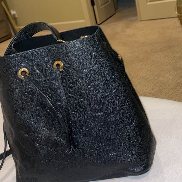 Louis Vuitton Handbags - Black with gold trim lv bucket bag